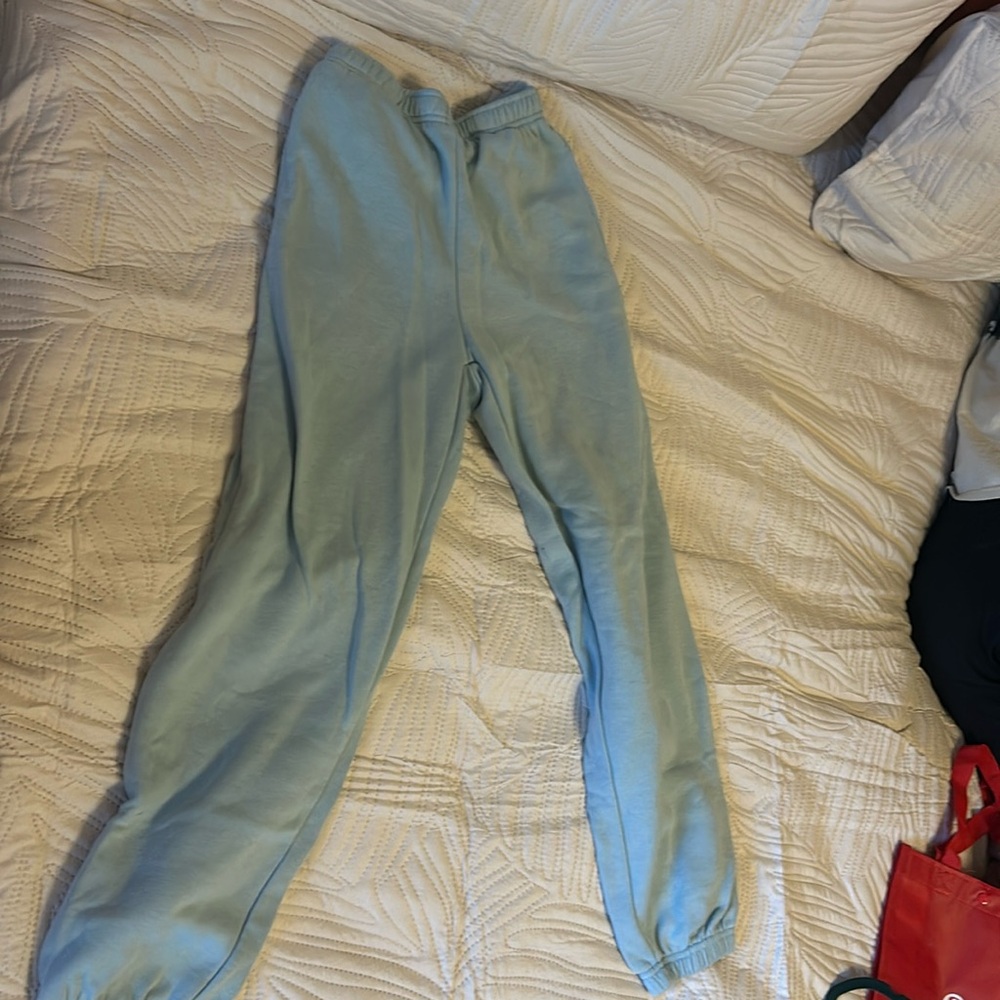 Light blue/light turquoise refuge athletics sweats